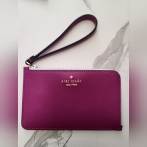 Kate Spade mini wristlet Rich Pinkish Purple colorblock..New with tag!